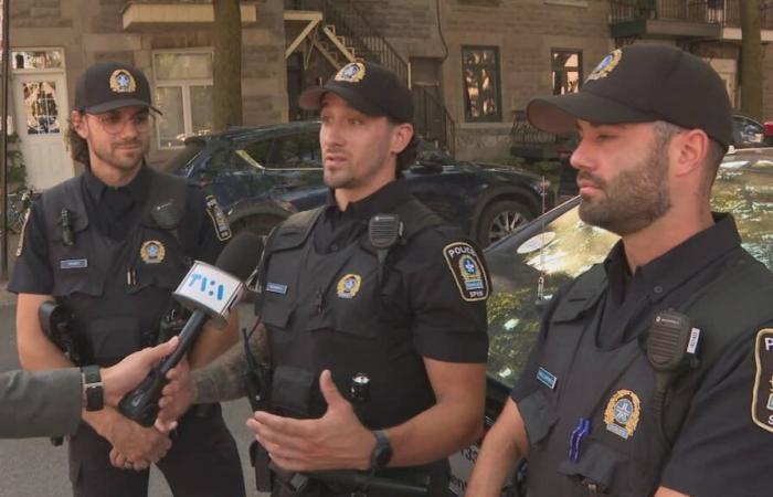 Des policiers en uniforme parmi les participants au marathon de Montréal