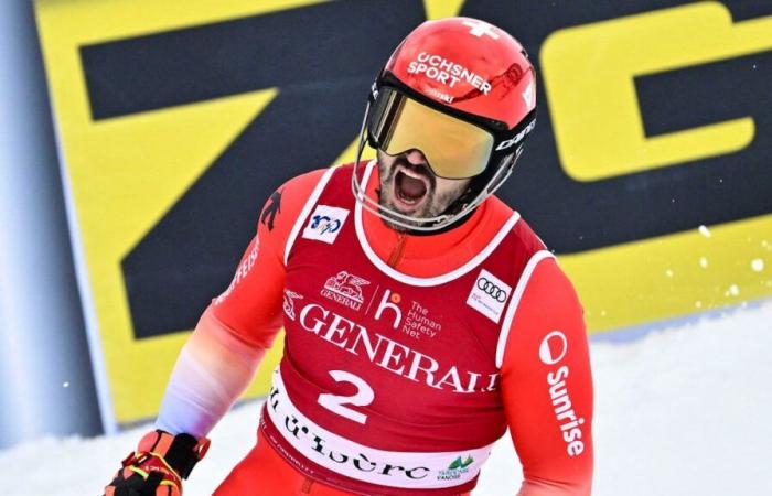 Loïc Meillard on the podium at the Val d’Isère slalom