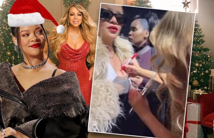 Mariah Carey signe un autographe sur la poitrine de Rihanna