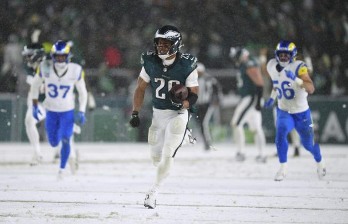 Les Eagles chevauchent l’héroïsme de Saquon Barkley, une position défensive tardive jusqu’à une victoire enneigée contre les Rams et une place pour le match pour le titre NFC