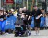 Une fille participe au marathon de Vancouver pour collecter des fonds pour Canuck Place