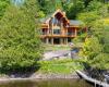 Une maison en rondins vendue pour 6,5 millions $ en Estrie