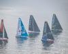 Skipper Sébastien Simon on Groupe Dubreuil at the start in the bay